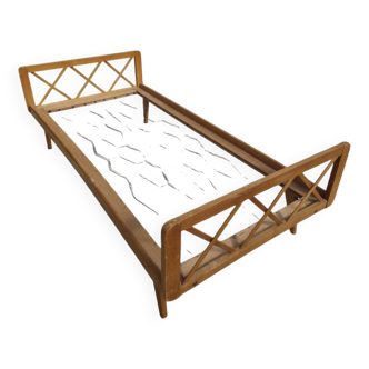 Vintage bed with compass feet from the 1950s