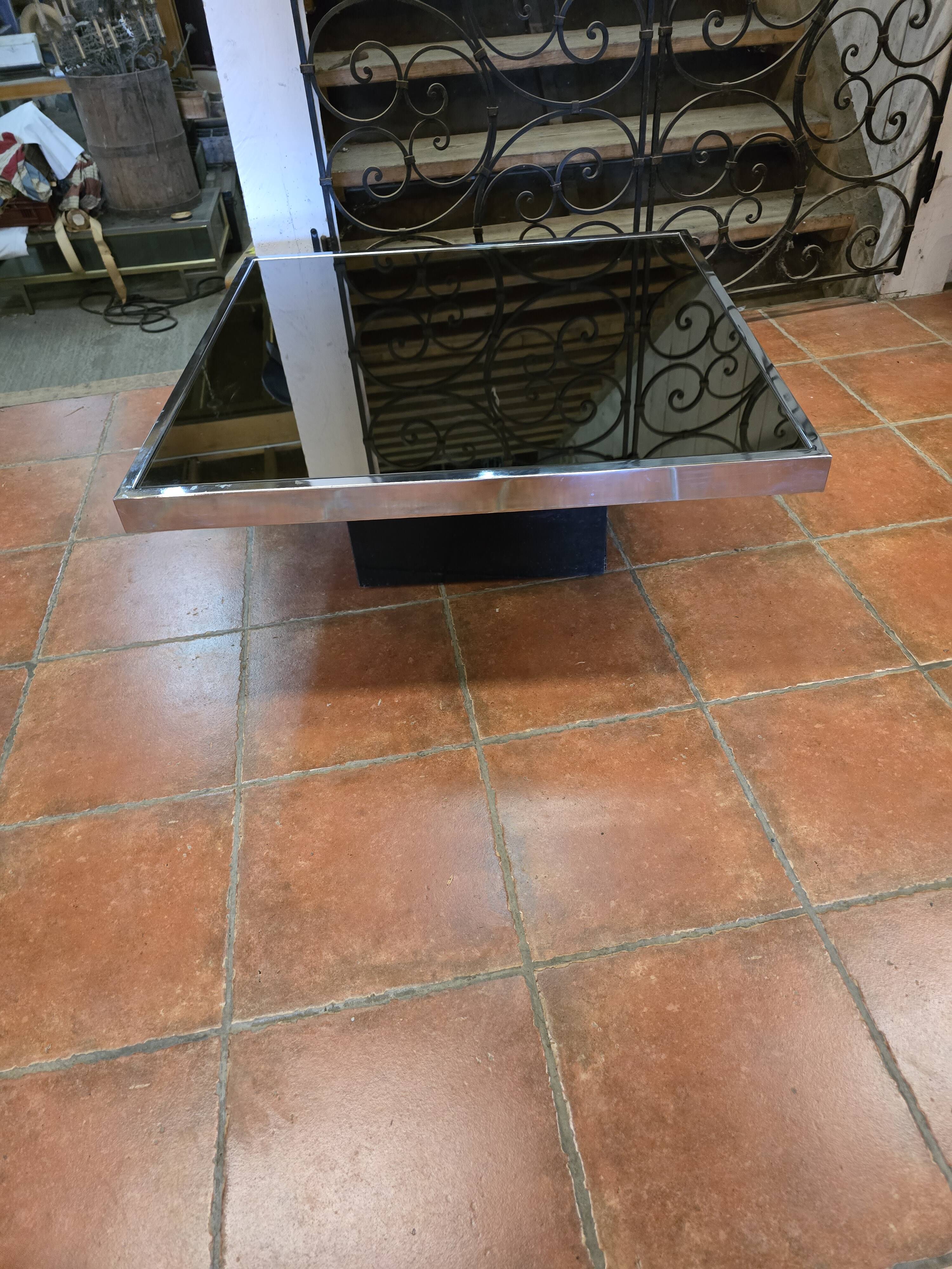 Chrome coffee table with smoked mirror top