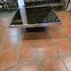 Chrome coffee table with smoked mirror top