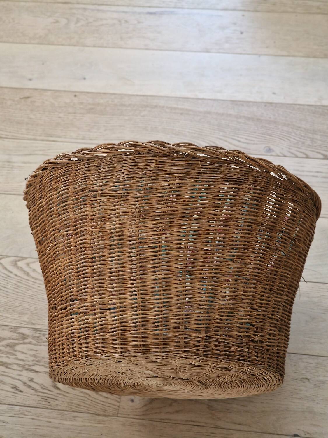 Vintage rattan basket lined with fabric