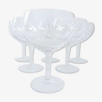 Suite of six beer glasses on foot in colorless crystal