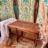 Piano bench seat in cane