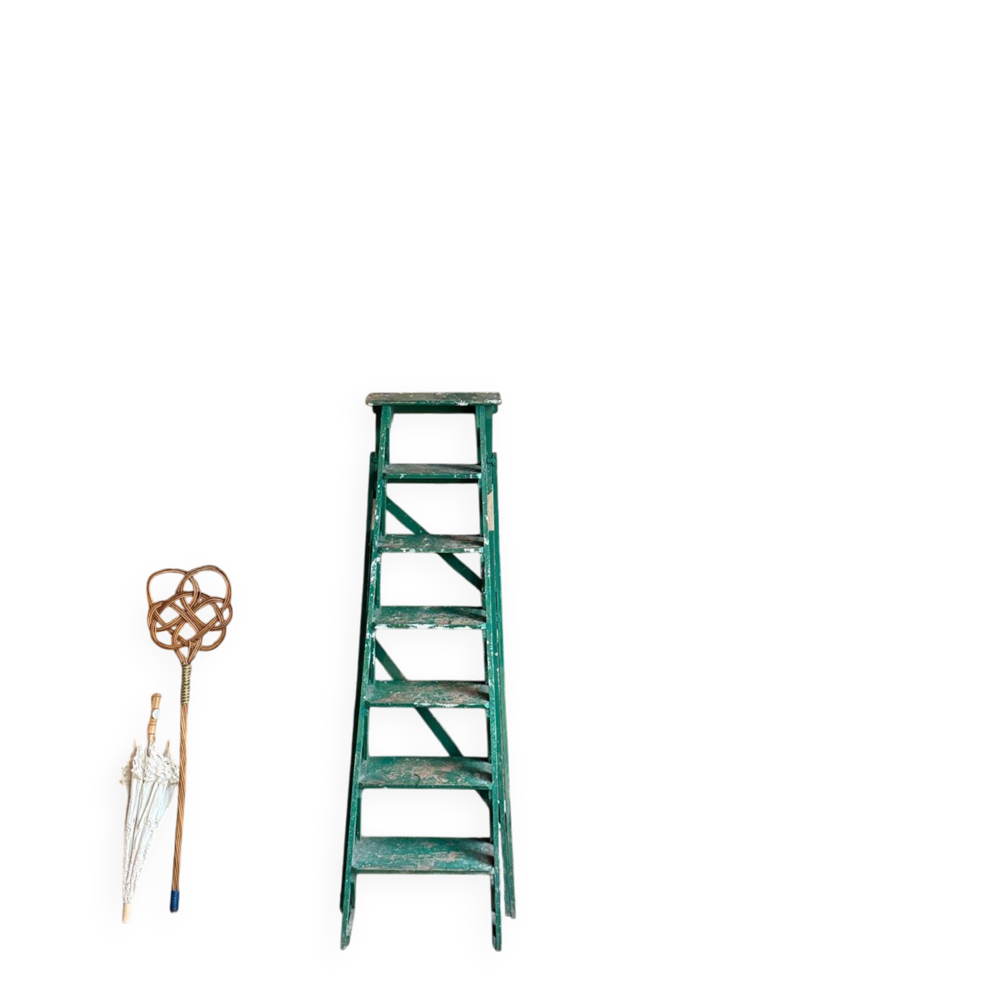 Vintage stepladder with green patina