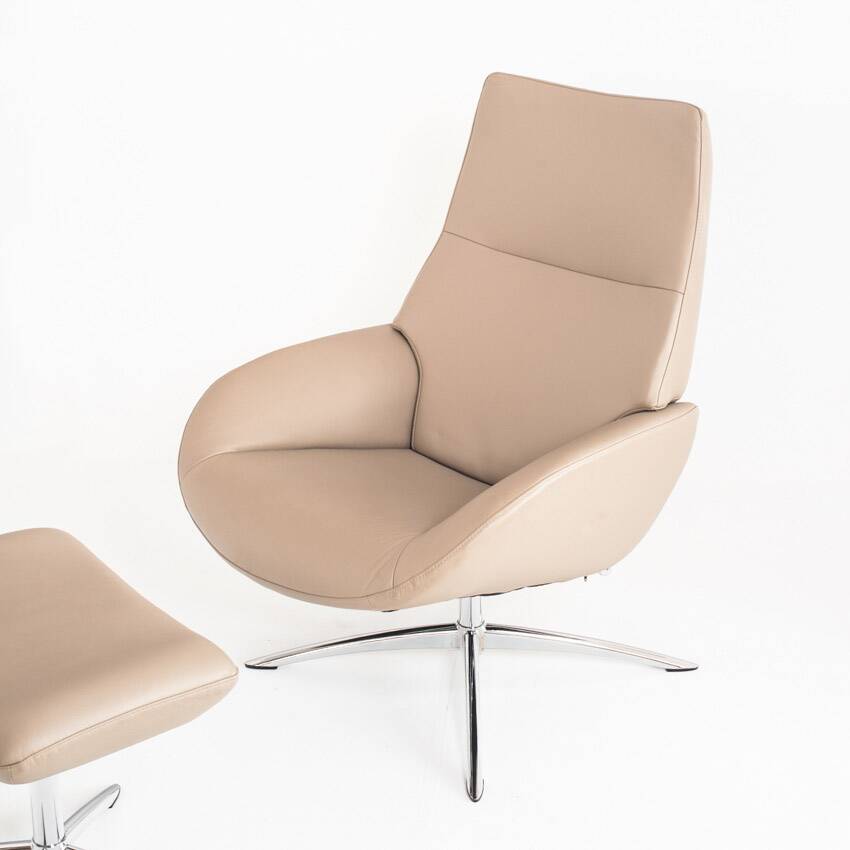 Leather armchair with footstool. Lotus model. Manufacturer: Kebe. Denmark