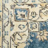Tapis persan bleu et beige