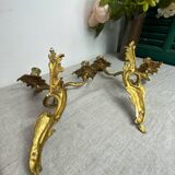 Two Louis XV style bronze wall candlesticks
