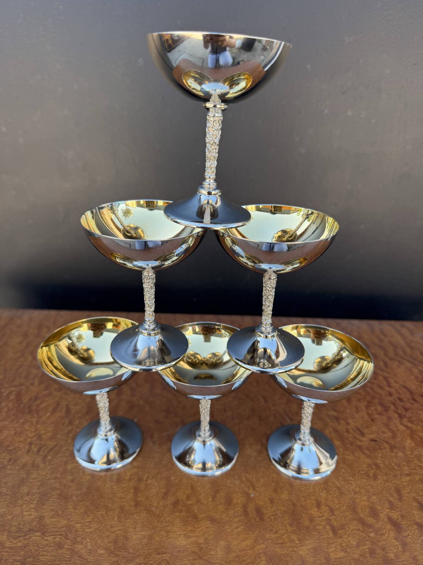 Silver-plated metal wine glasses on stems from the 1970s.
