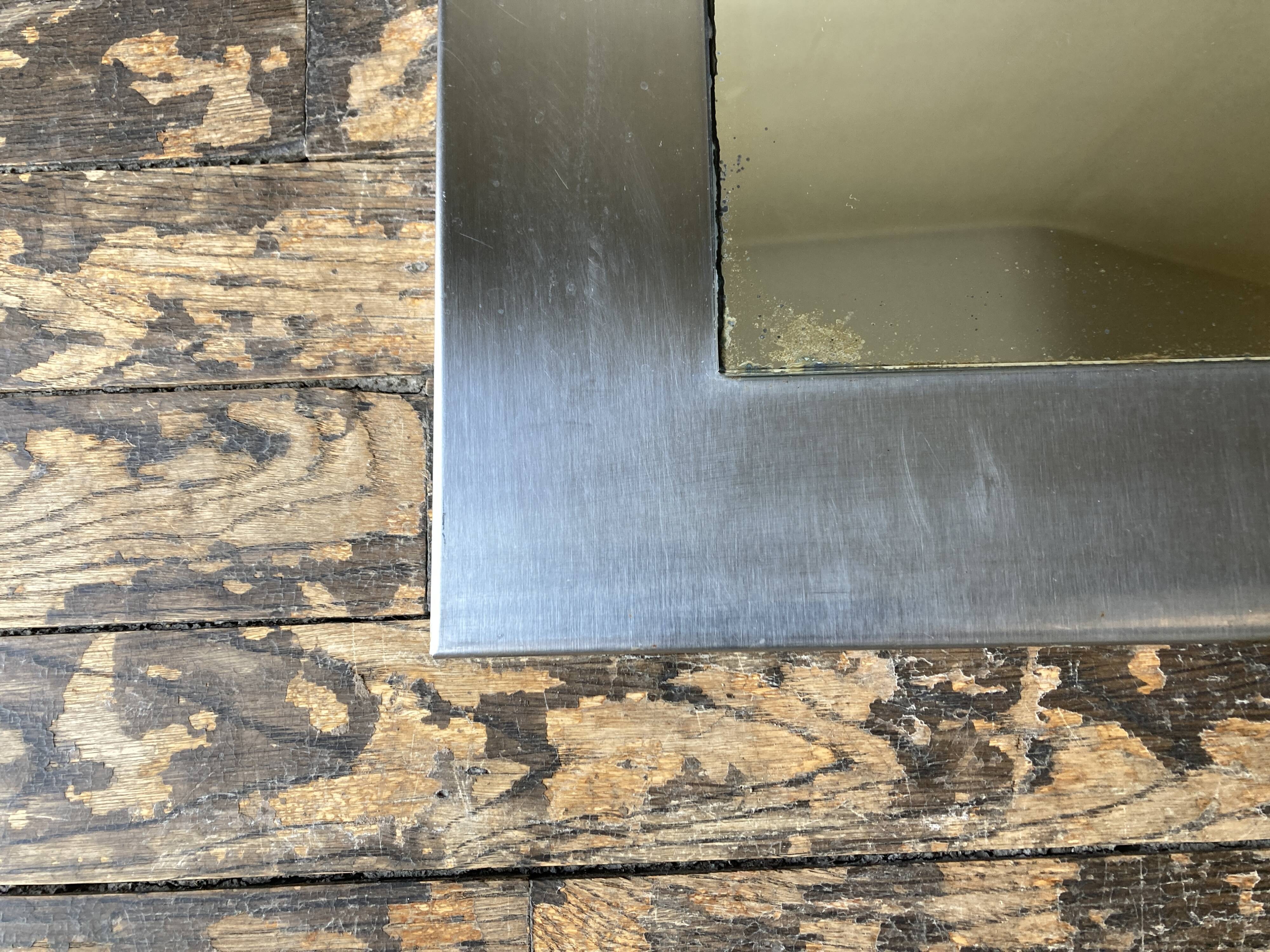 1970s space age steel mirror