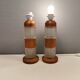 Swedish table lamps made of teak wood and hard pressed crystal glass.
