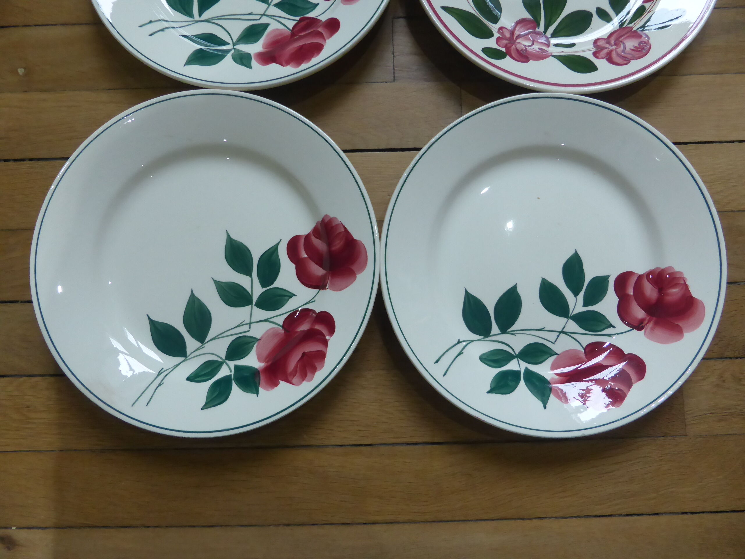 Set of 4 antique mixed flat plates