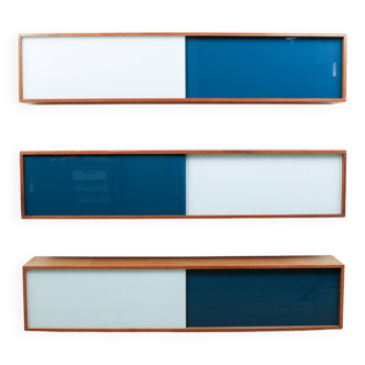Vintage mid-century wall hung oak cabinets, blue & white sliding glass door
