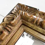 Gold-tinted wooden and stucco rectangular mirror - 1920