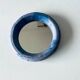 Round ceramic wall mirror