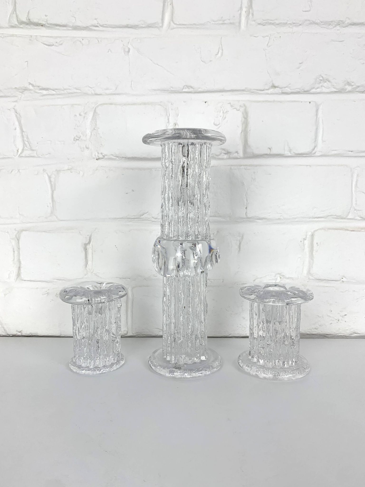 Glass candle holders by Göran Wärff for Kosta Boda, Sweden, 1970s.