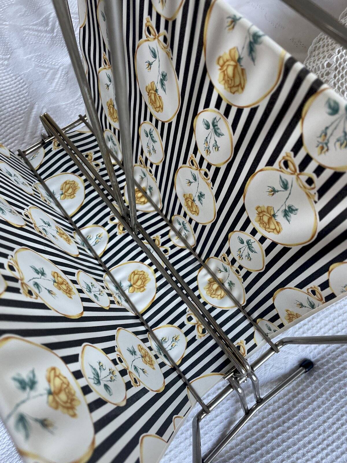 Vintage metal and plastic-coated fabric magazine rack