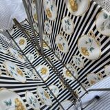 Vintage metal and plastic-coated fabric magazine rack