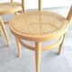 Paire chaises Baumann bois clair et cannage