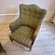 Modern Danish armchairs by Alfred Christensen. Beautiful shape, brass legs.