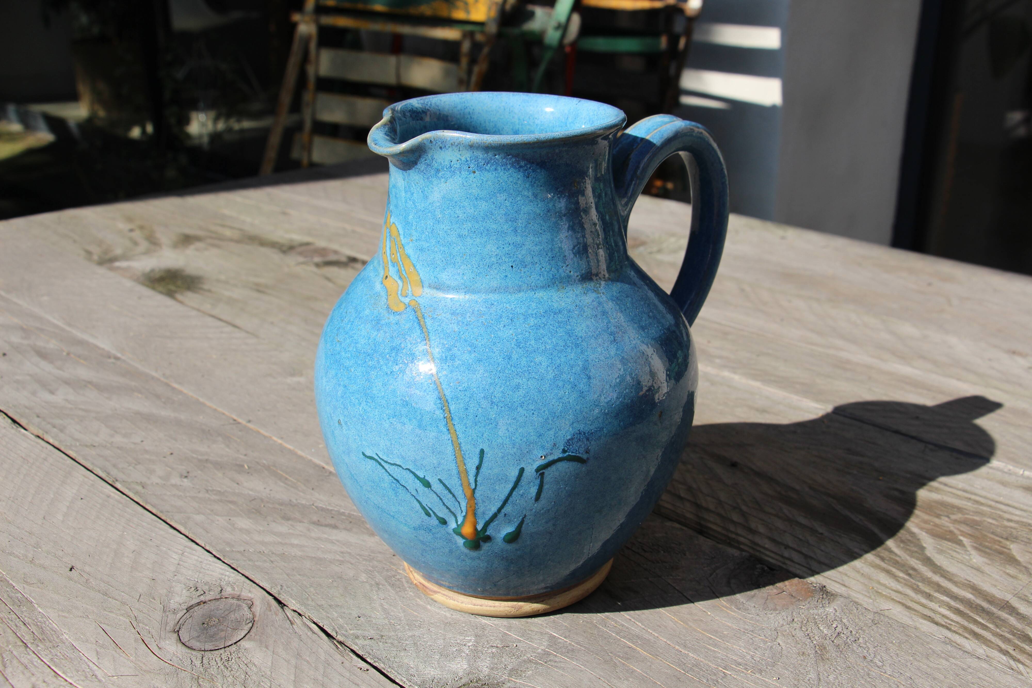 Blue ceramic pitcher