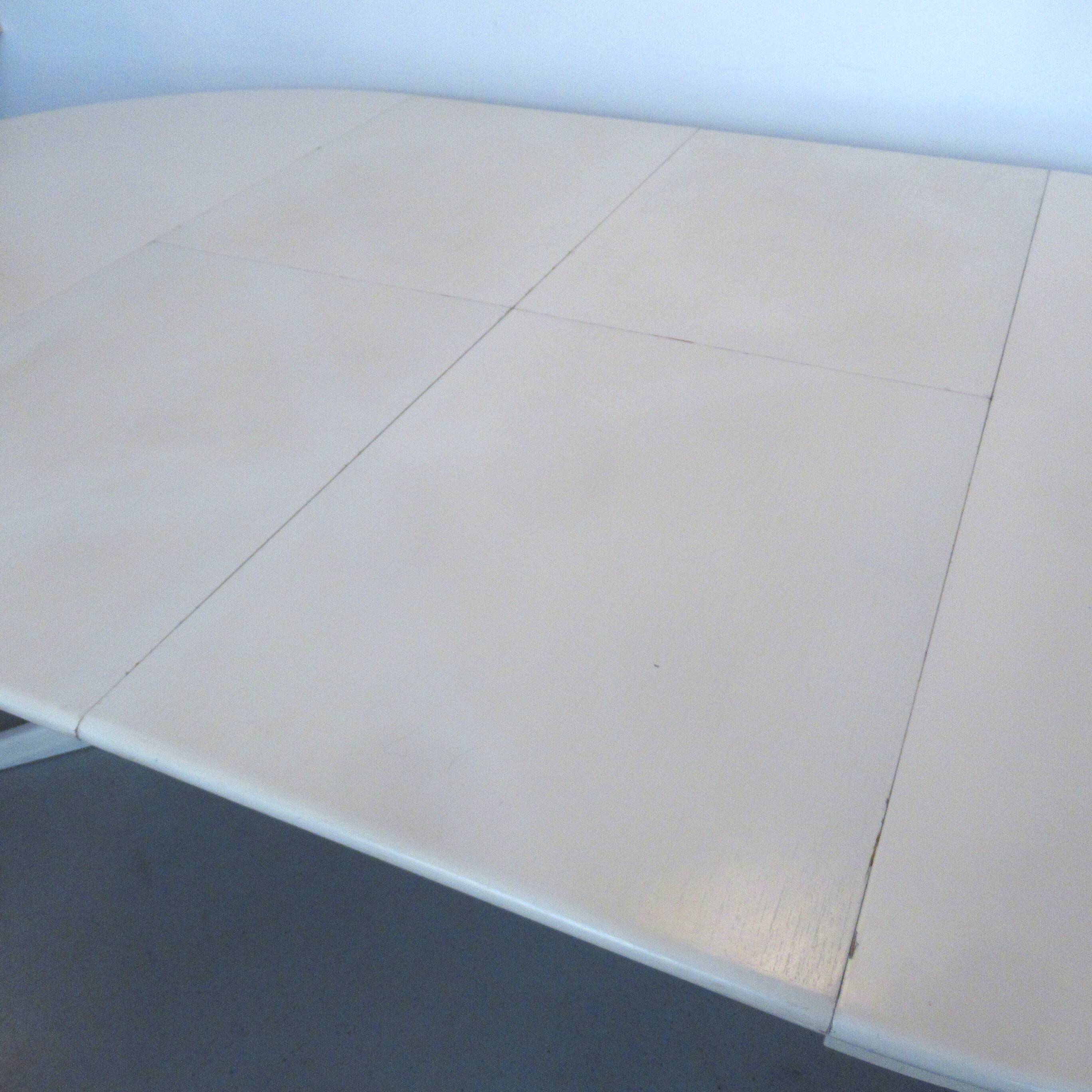Extendable Danish dining room round table from the 1960s.