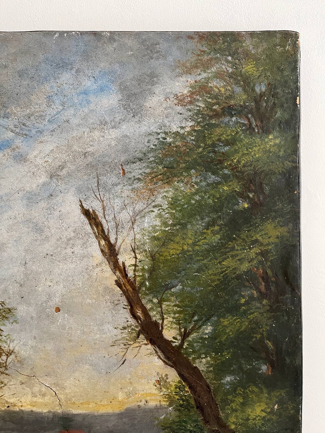 Old oil painting on canvas of a landscape by the pond.