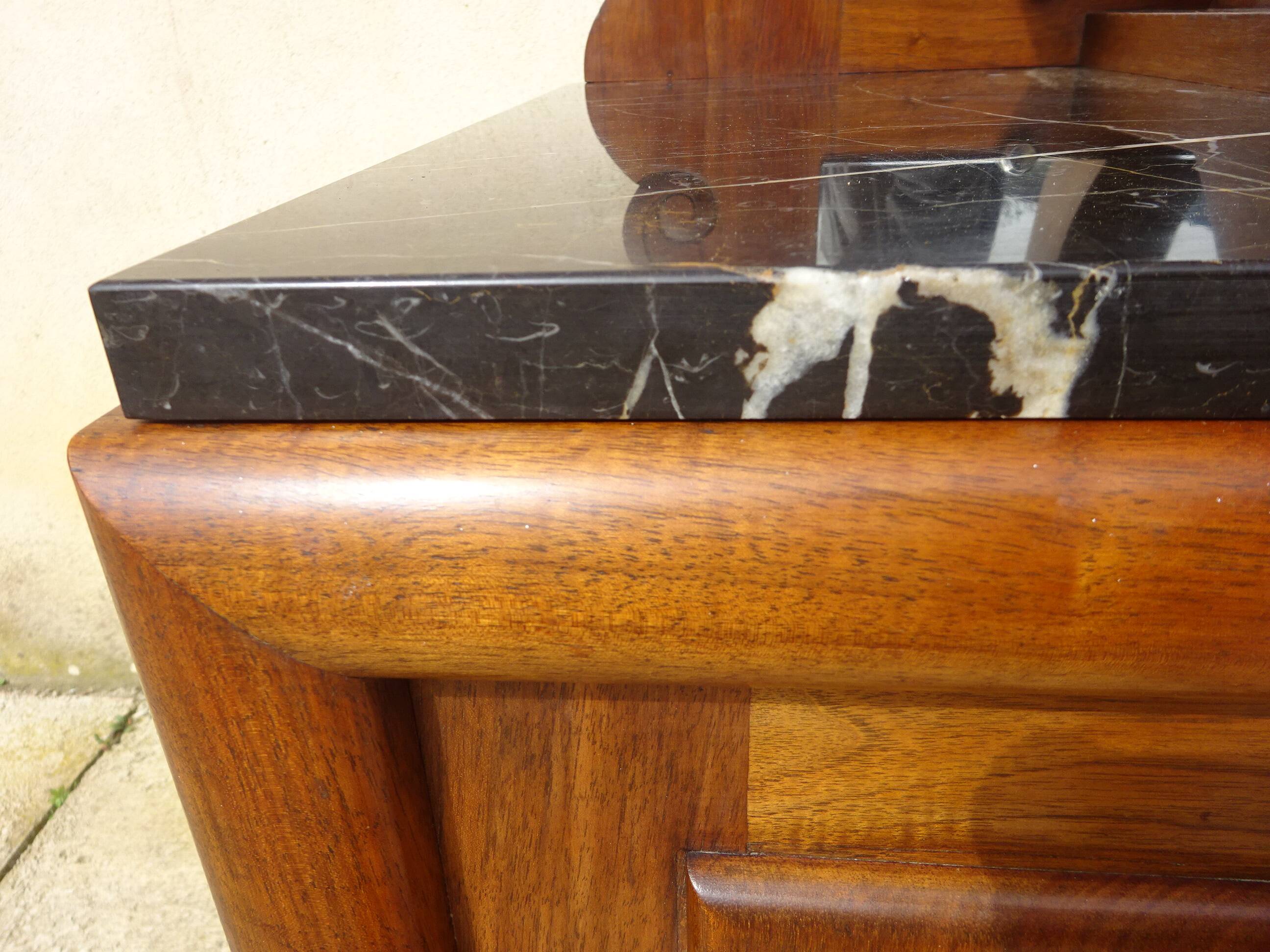 Solid walnut sideboard, moustache legs, black marble top.