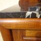 Solid walnut sideboard, moustache legs, black marble top.