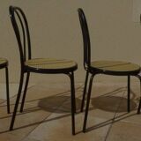 4 Chaises bistrot en métal noir et assise cannage plastique