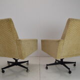 Pair of mid-century swivel armchairs with wheels 1970's