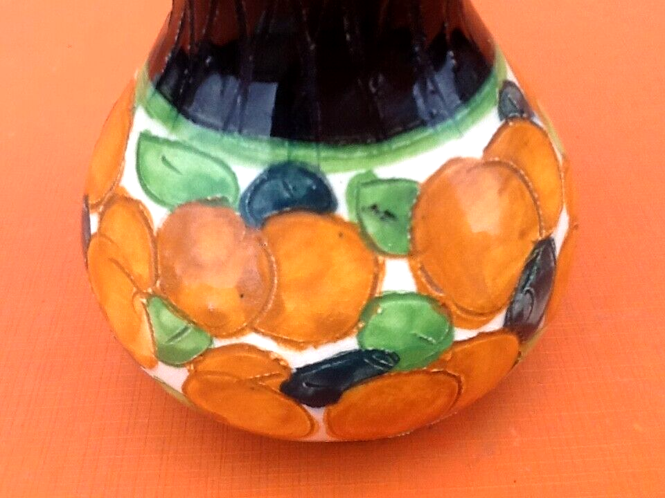 1940s Polychrome ceramic vase decorated with fruit and foliage