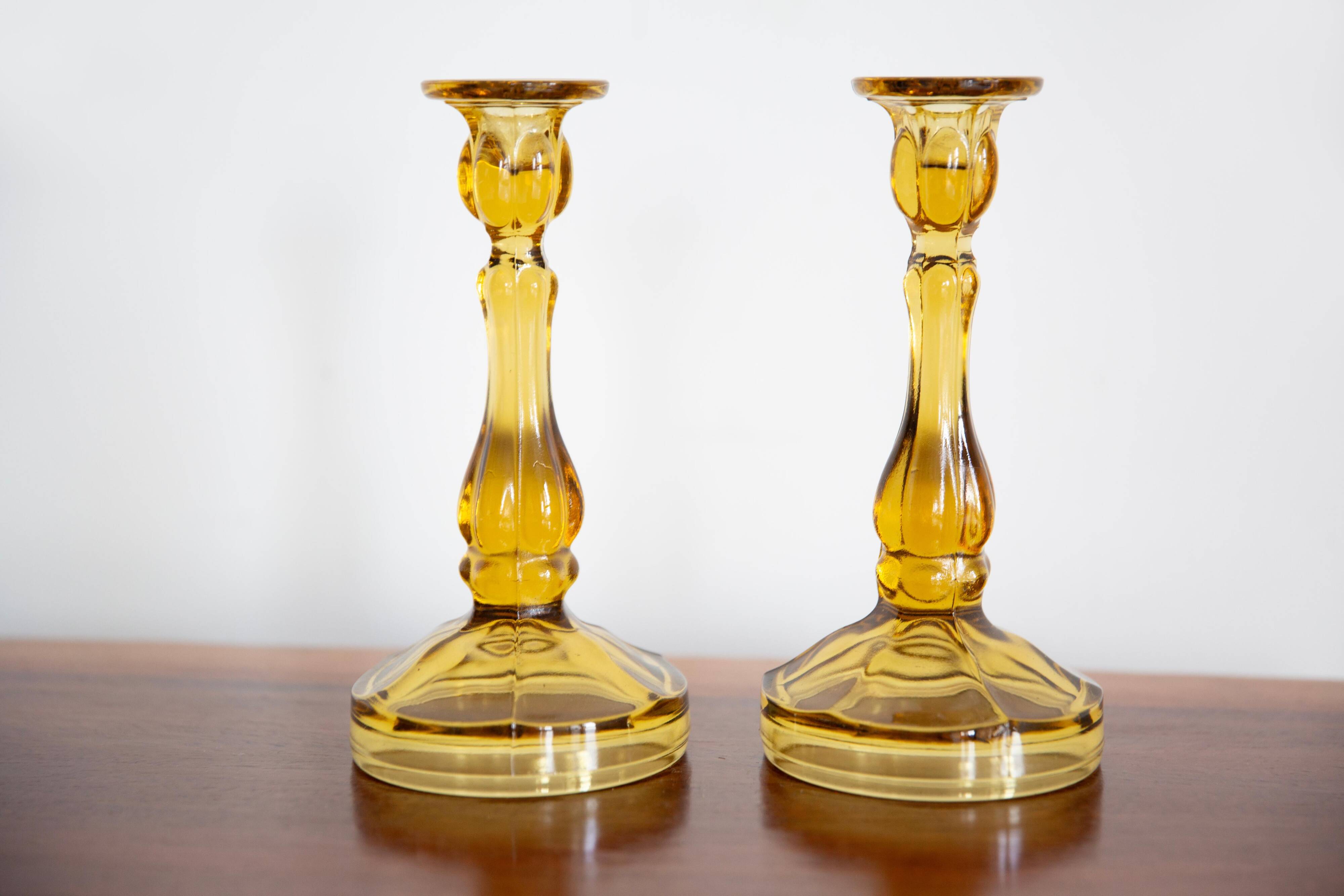 Set of two yellow glass candlesticks, Mid-Century Modern, Europe, 1960s.