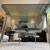 Double top coffee table in smoked glass and tubular structure in chromed steel