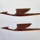 Pair of rare mid-century wooden wall sculptures representing birds and herons, Denmark, 1960s.