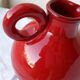 Red ceramic pitcher