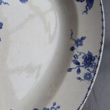 Antique serving dish in white and blue earthenware.