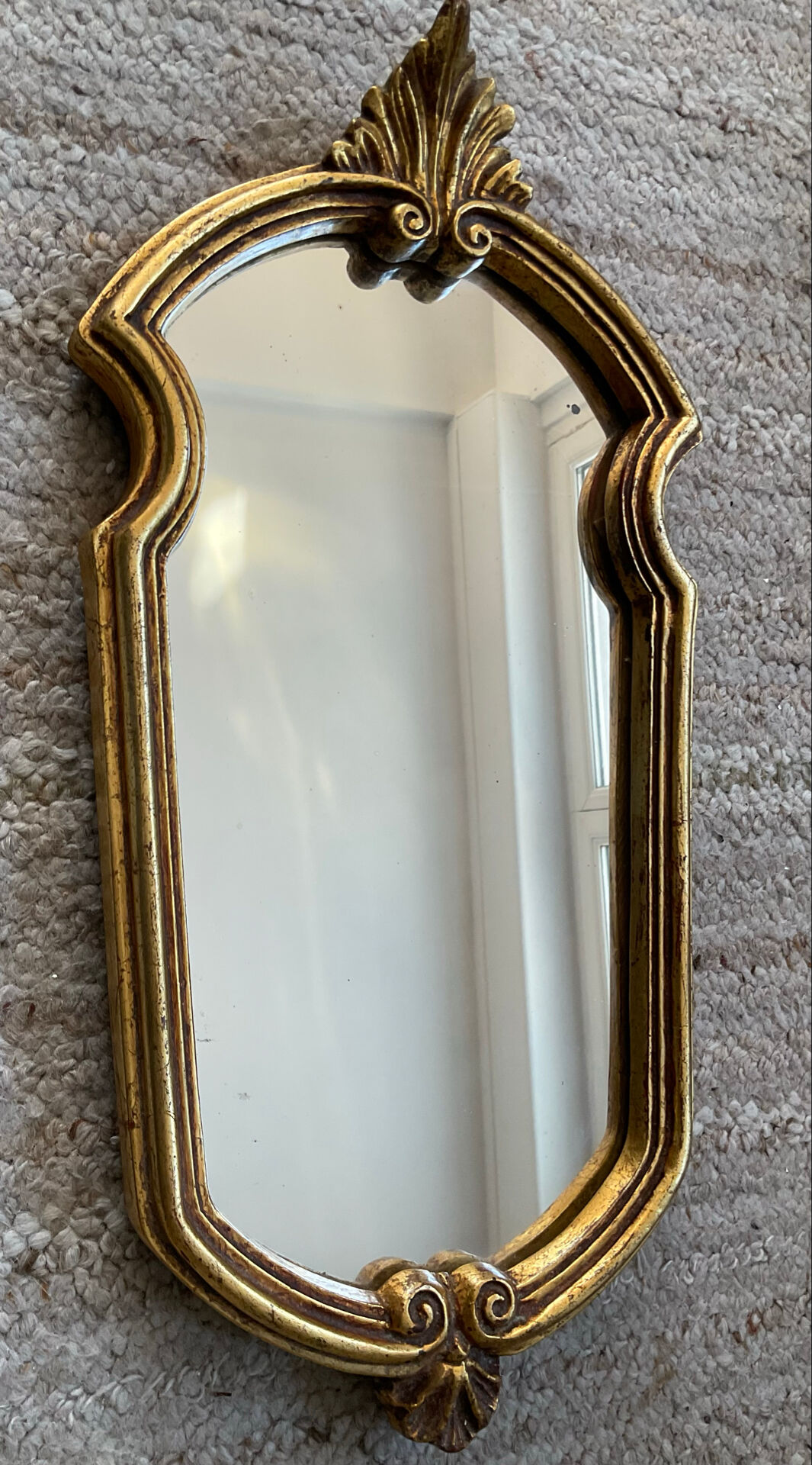 Vintage gilded wood Rococo mirror from the 1970s.