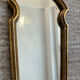 Vintage gilded wood Rococo mirror from the 1970s.