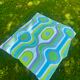 Flat sheet in printed psychedelic blue-green tergal.