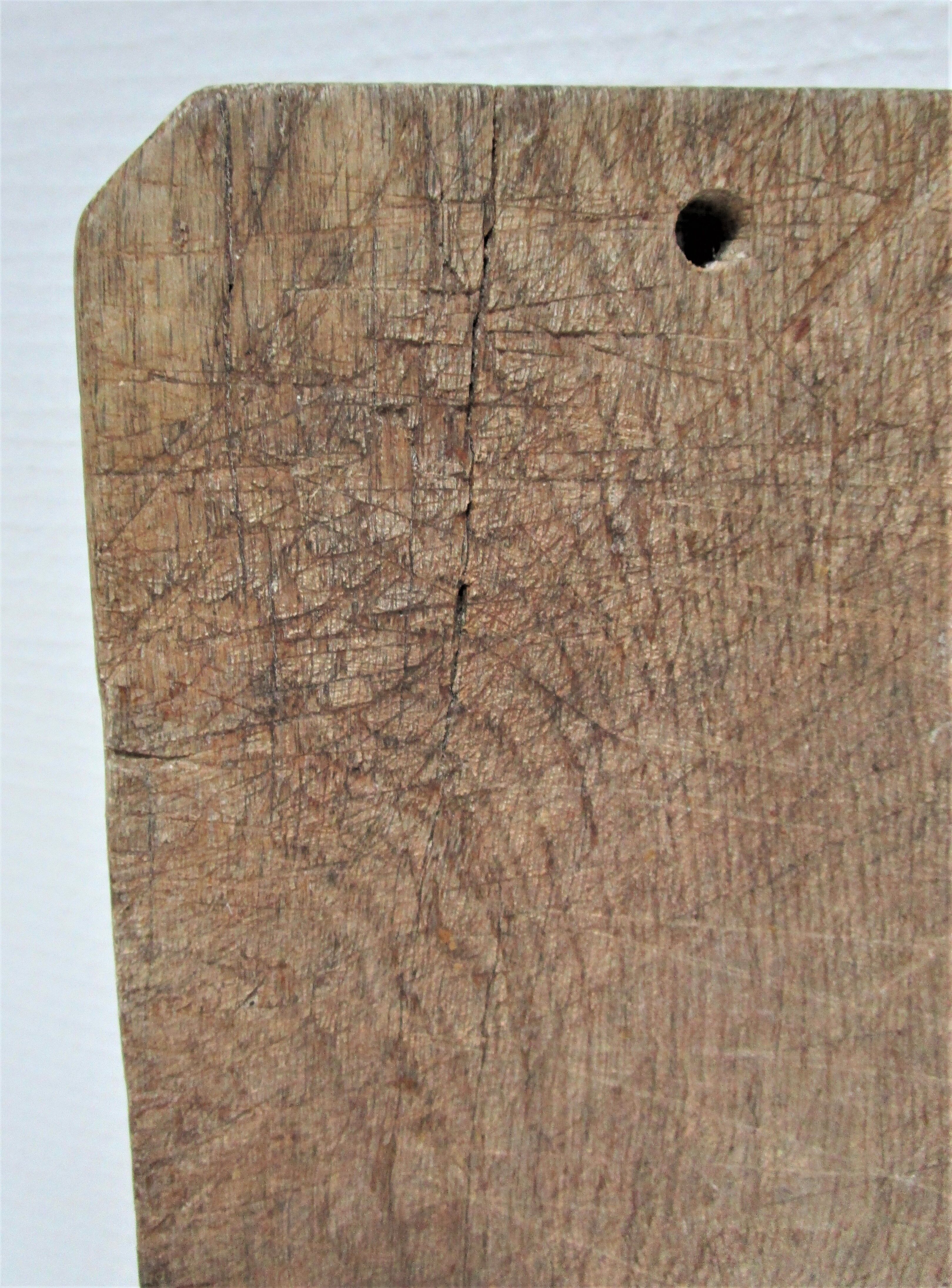 three vintage patinated solid wood cutting boards