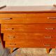 Vintage chest of drawers with tapered legs