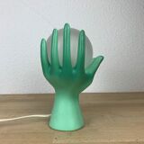 Green ceramic hand lamp and glass globe