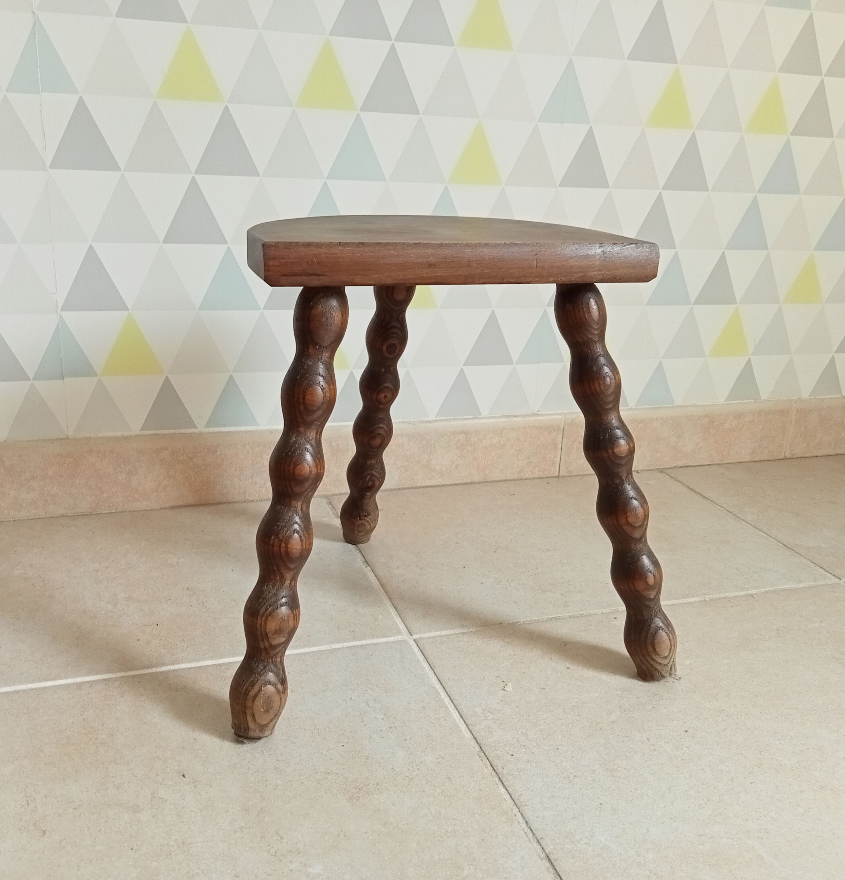 Vintage tripod stool in turned wood