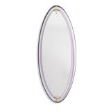 Lacquered and patinated brass mirror, ovoid shape. 1950s/60s.