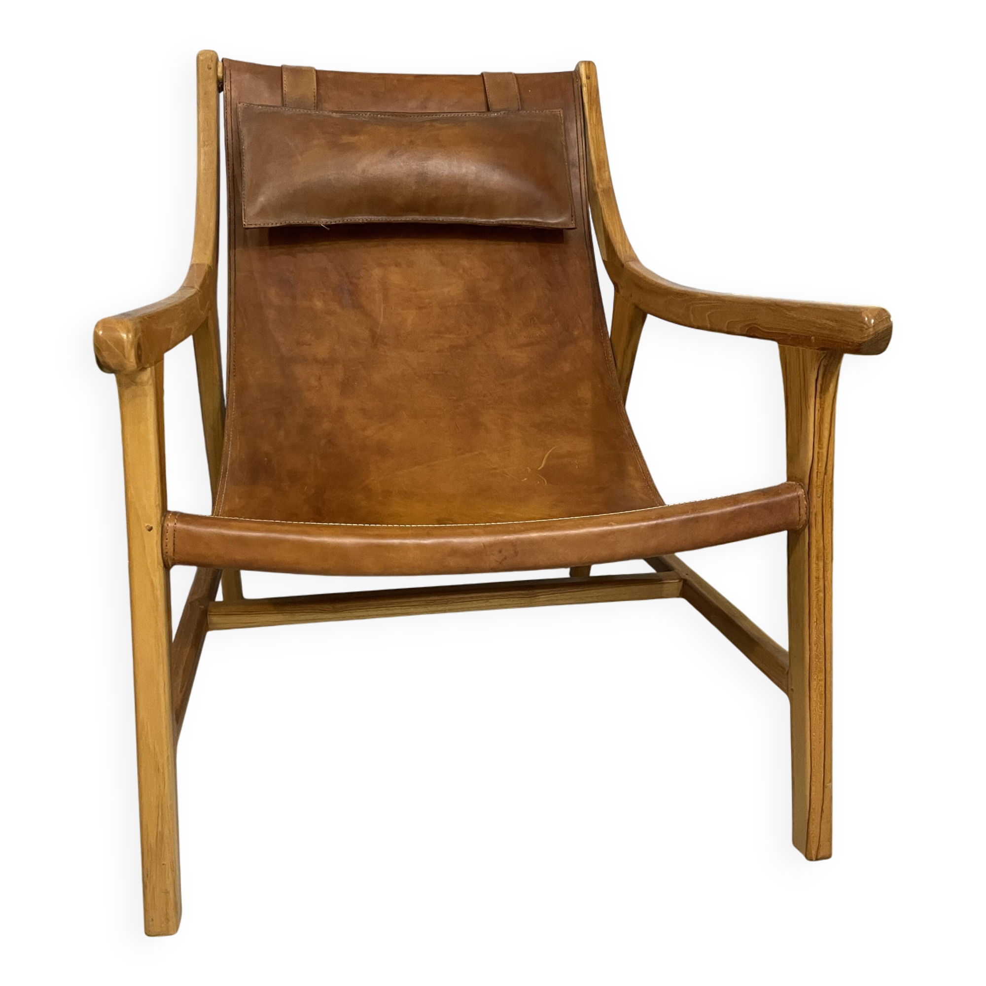 Colonial armchair in leather and wood