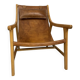 Colonial armchair in leather and wood