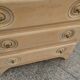 Vintage commode with tapered legs.
