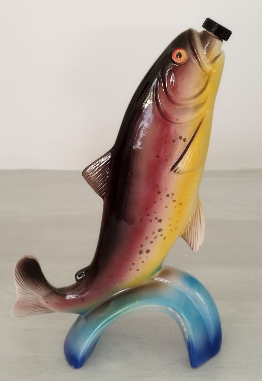Vintage earthenware fish bottle