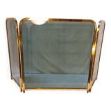 Vintage fireplace screen in smoked glass and gold-tone metal