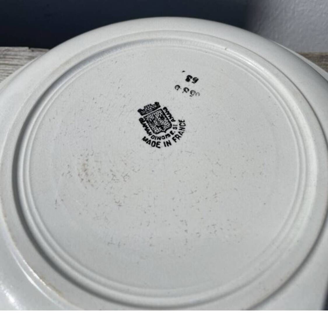 Round, shallow ceramic salad bowl from Saint Amand