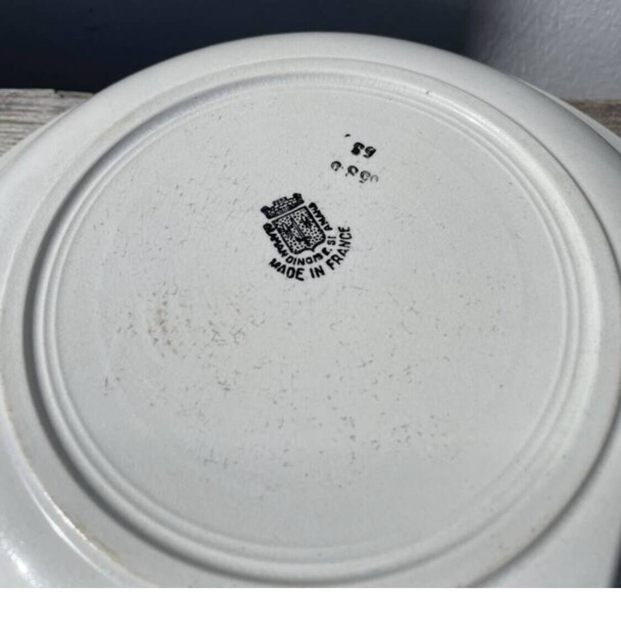 Round, shallow ceramic salad bowl from Saint Amand